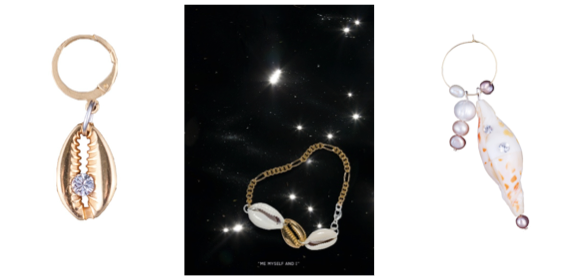 A collection of sea shell earrings and necklaces on a black background.