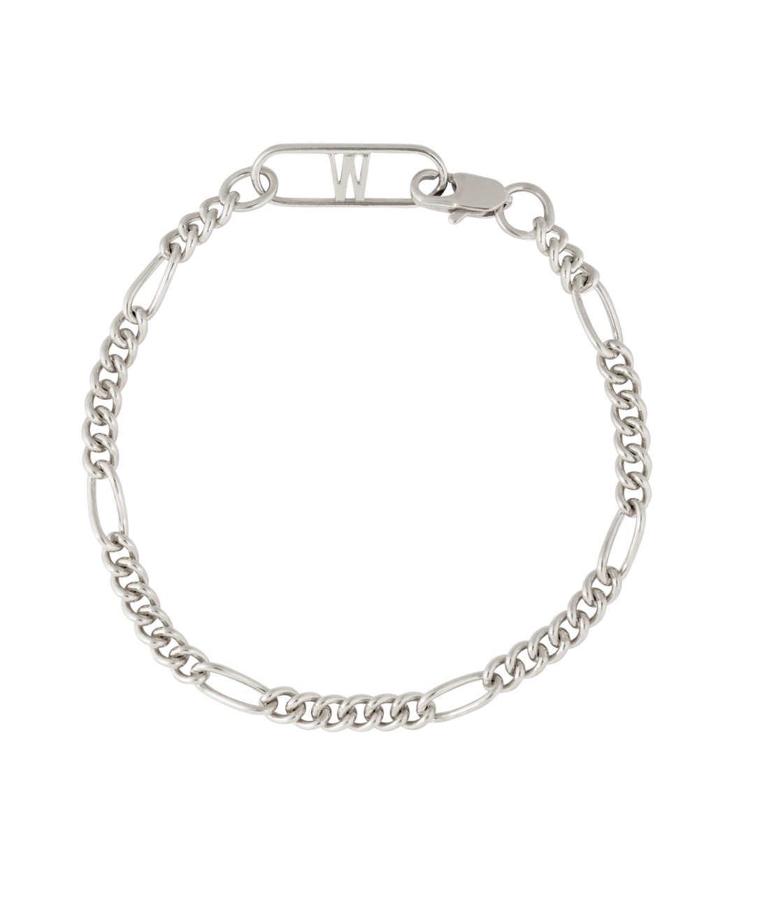 The Naomi Bracelet Silver by WALD Berlin features alternating curb and elongated links, inspired by German design, with a clasp and a bar topped with the letter "W.