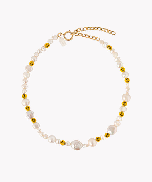 A Smilie Dude Pearl Necklace by WALD Berlin, a jewelry brand from Germany.