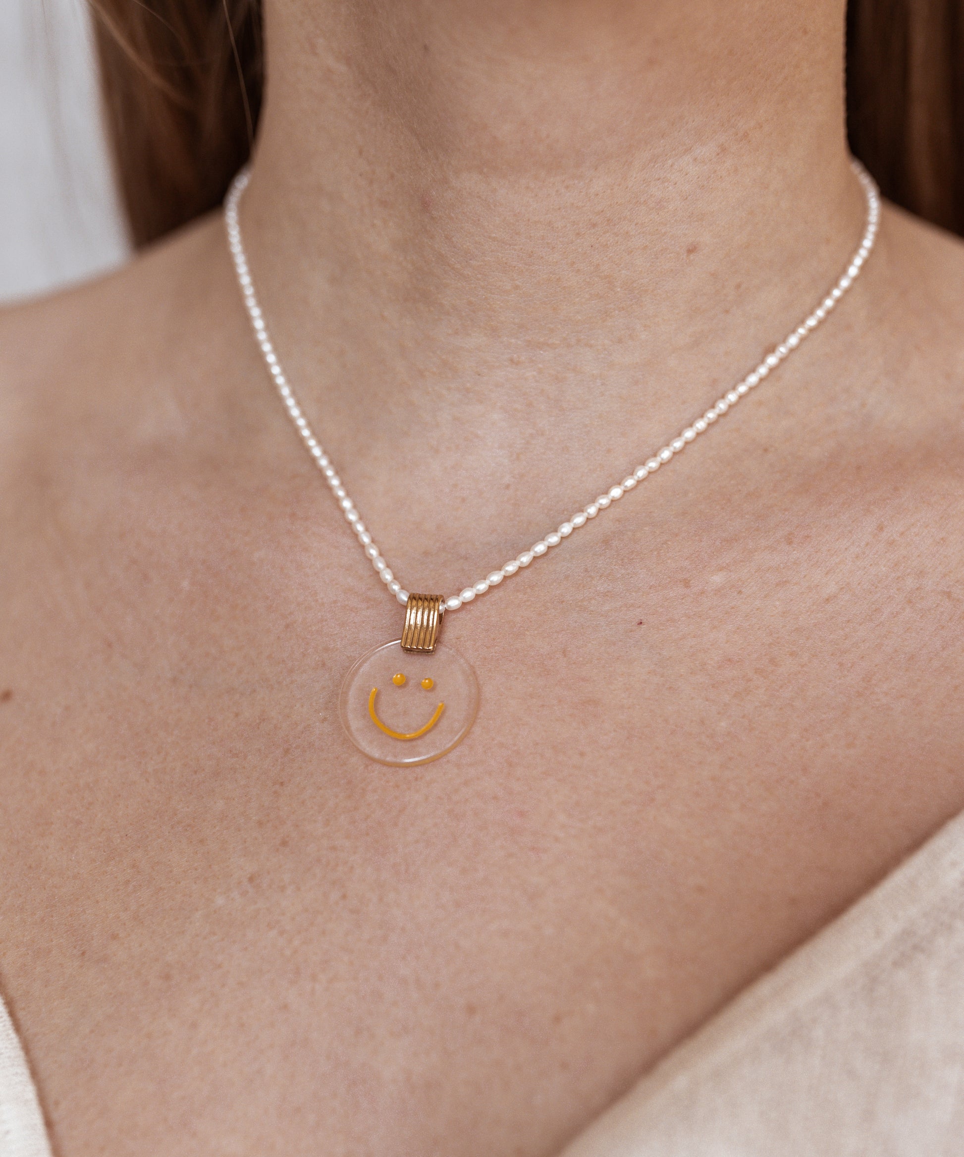 A German woman donning a WALD Berlin necklace.