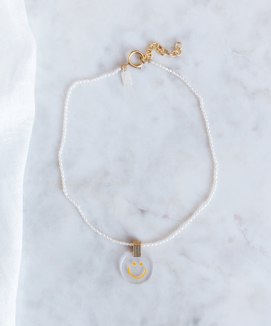 A Smilie Dude Pearl Medaillon Necklace from WALD Berlin, Germany's jewelry brand.